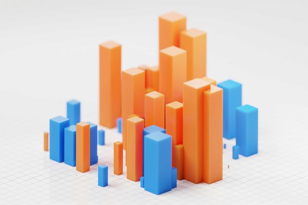 A 3D illustration of a bar chart with orange and blue bars