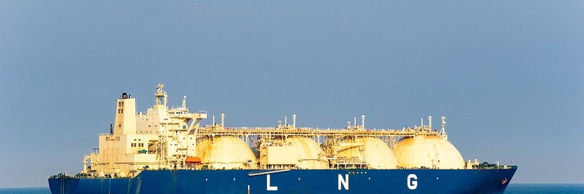 A blue and white ship at sea with LNG written on the side of it.