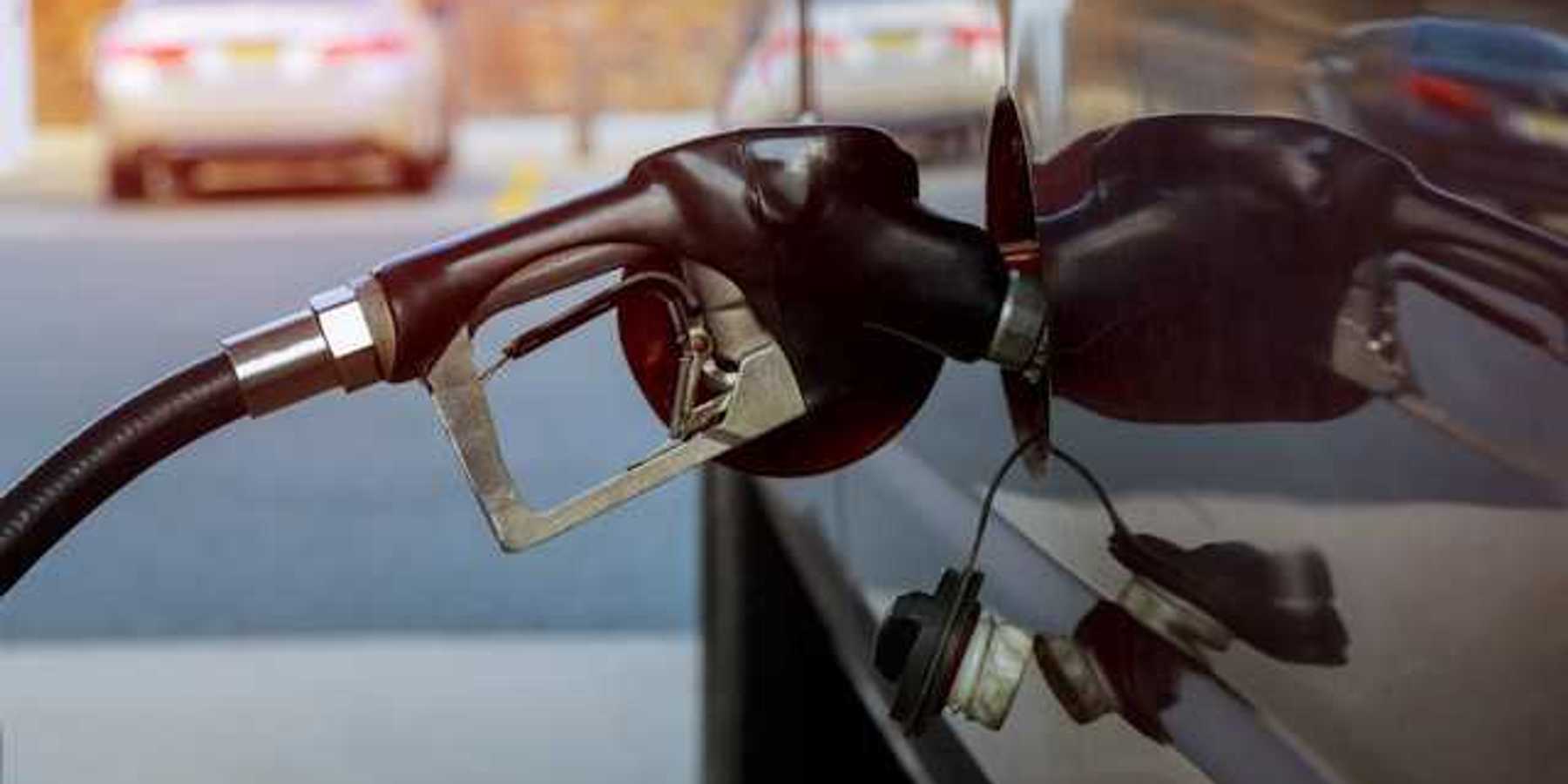 A car being filled with gas