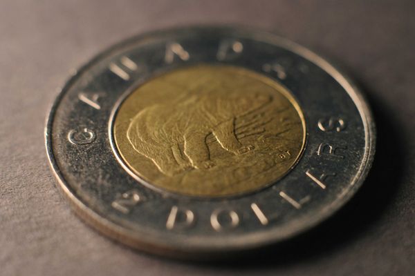 A close up of a coin on a table