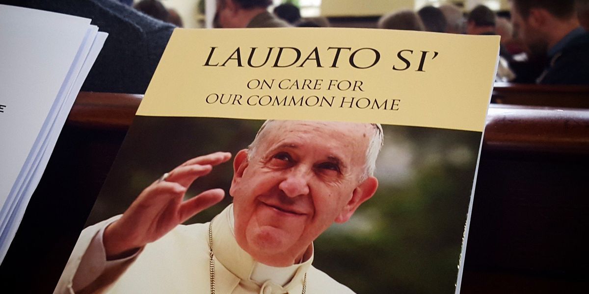 A copy of Pope Francis' Laudato Si encyclical.