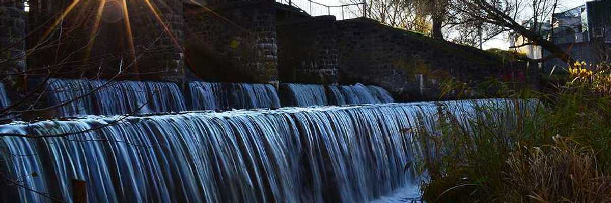 A dam allowing water to flow