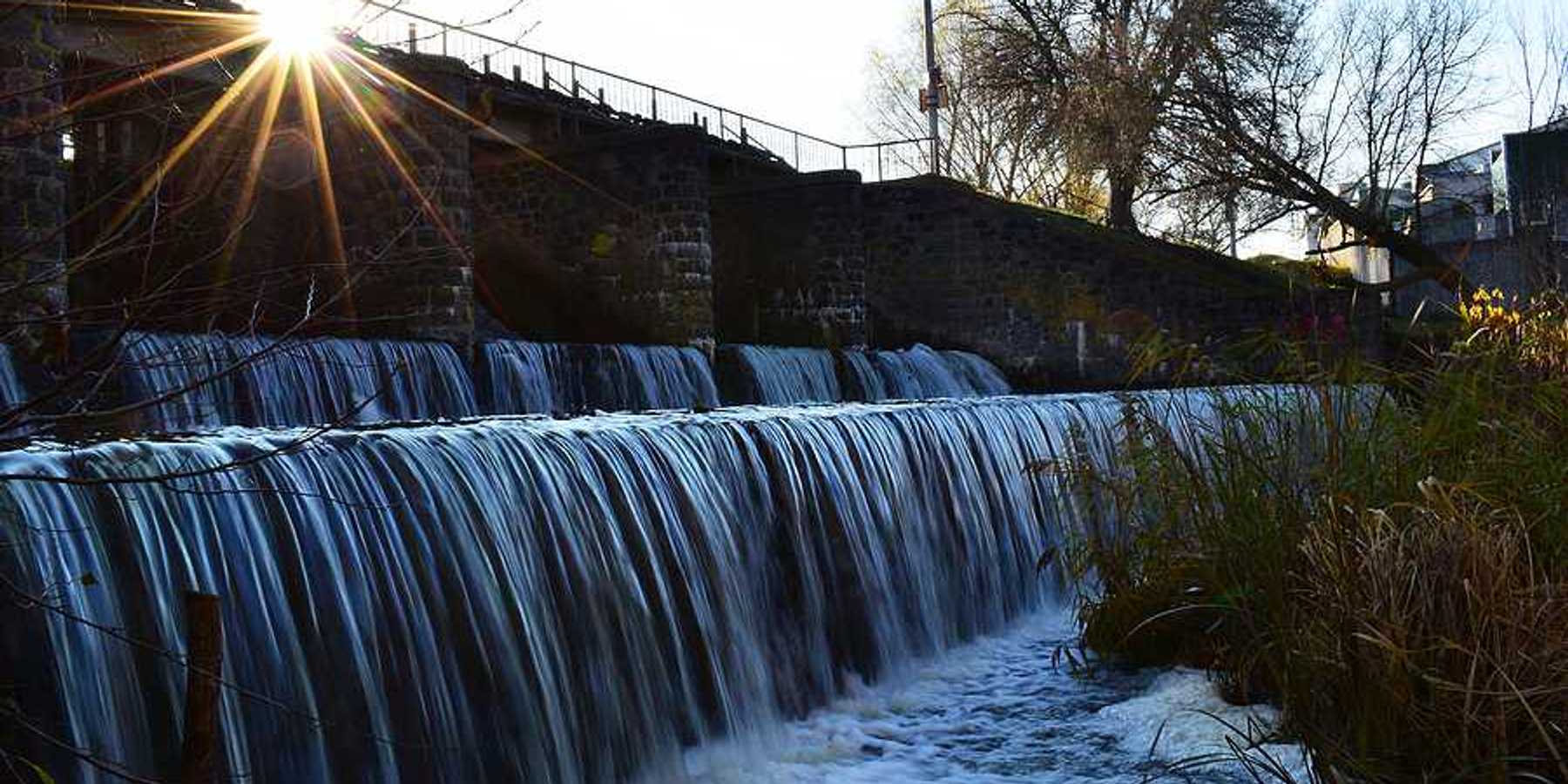 A dam allowing water to flow