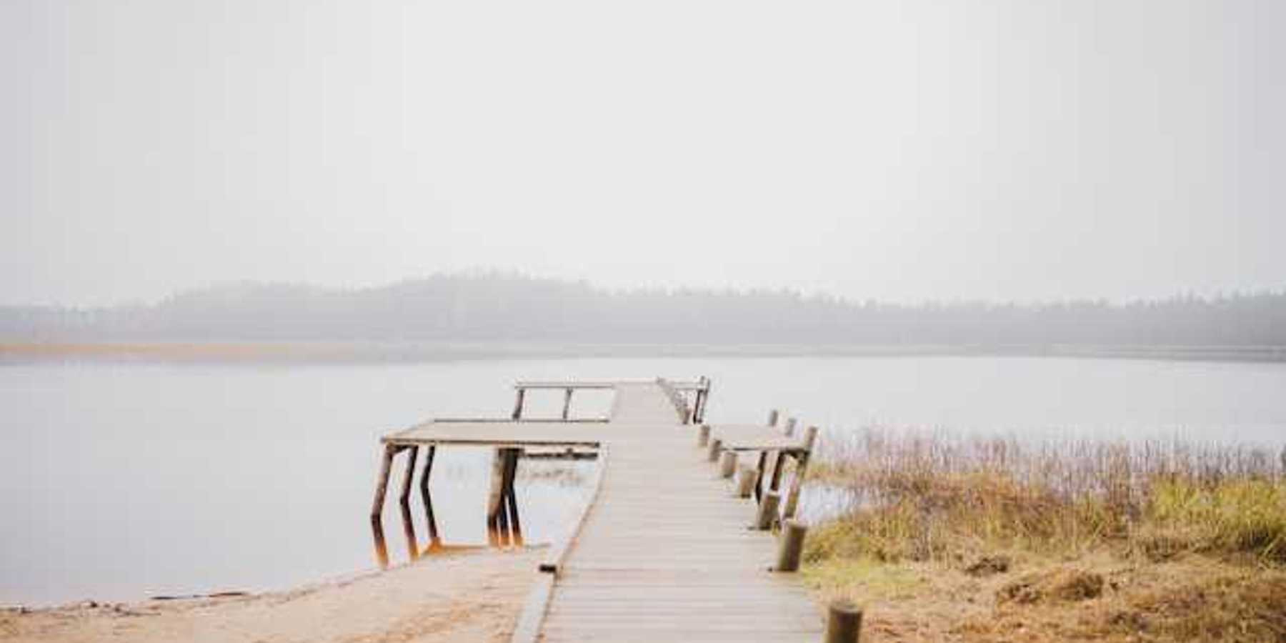 A dock stretching into a body of water