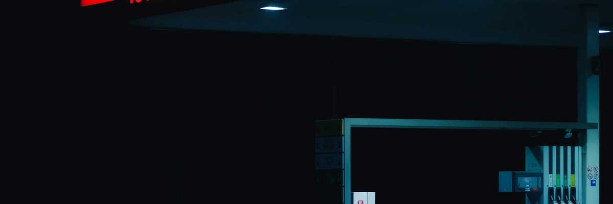 a gas station at night.