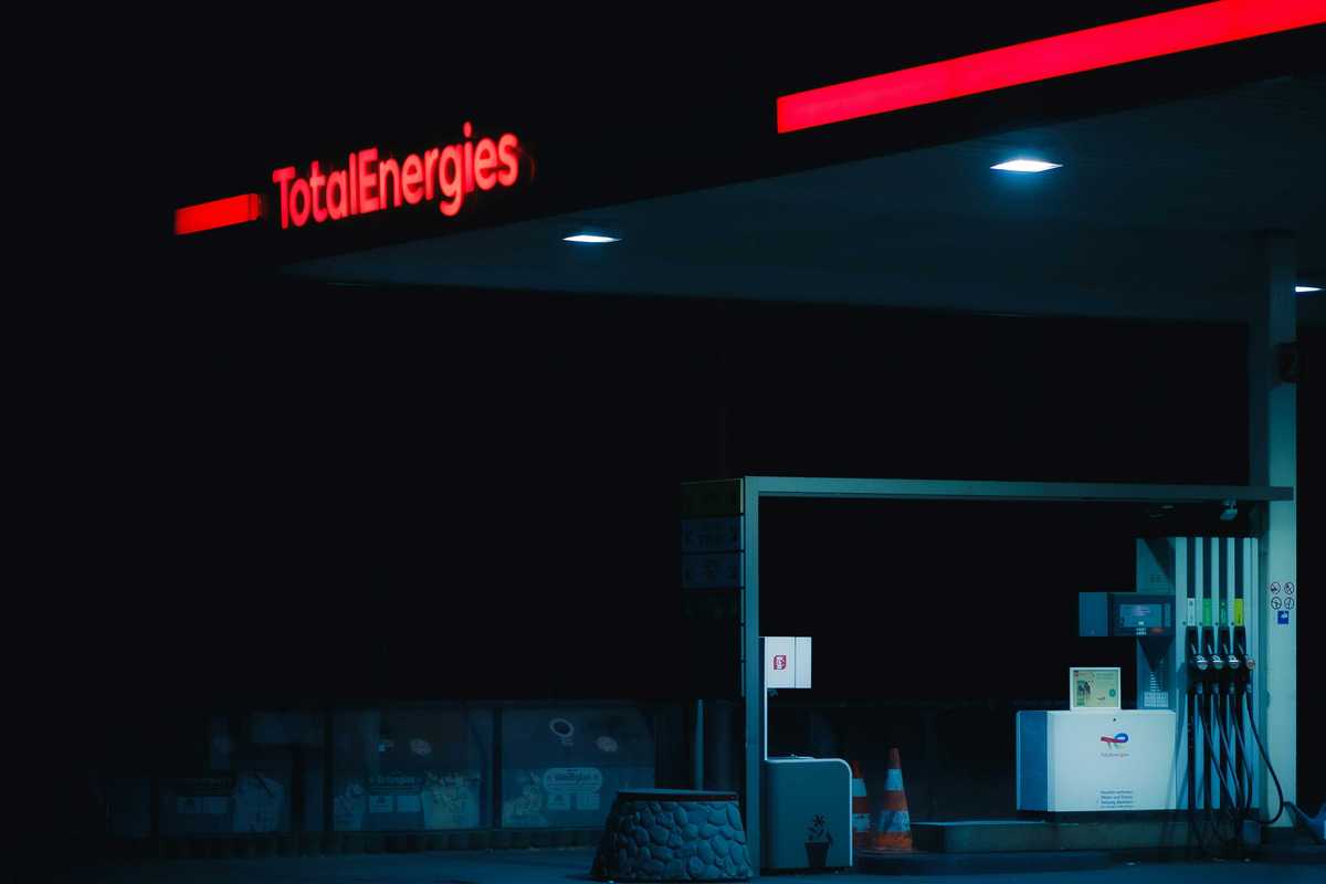 a gas station at night.