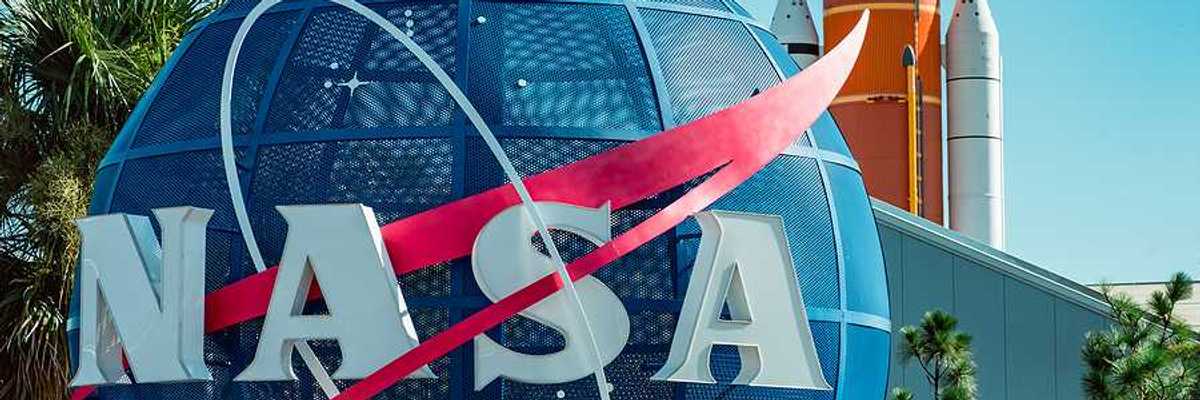 A large blue globe with the letters NASA on it