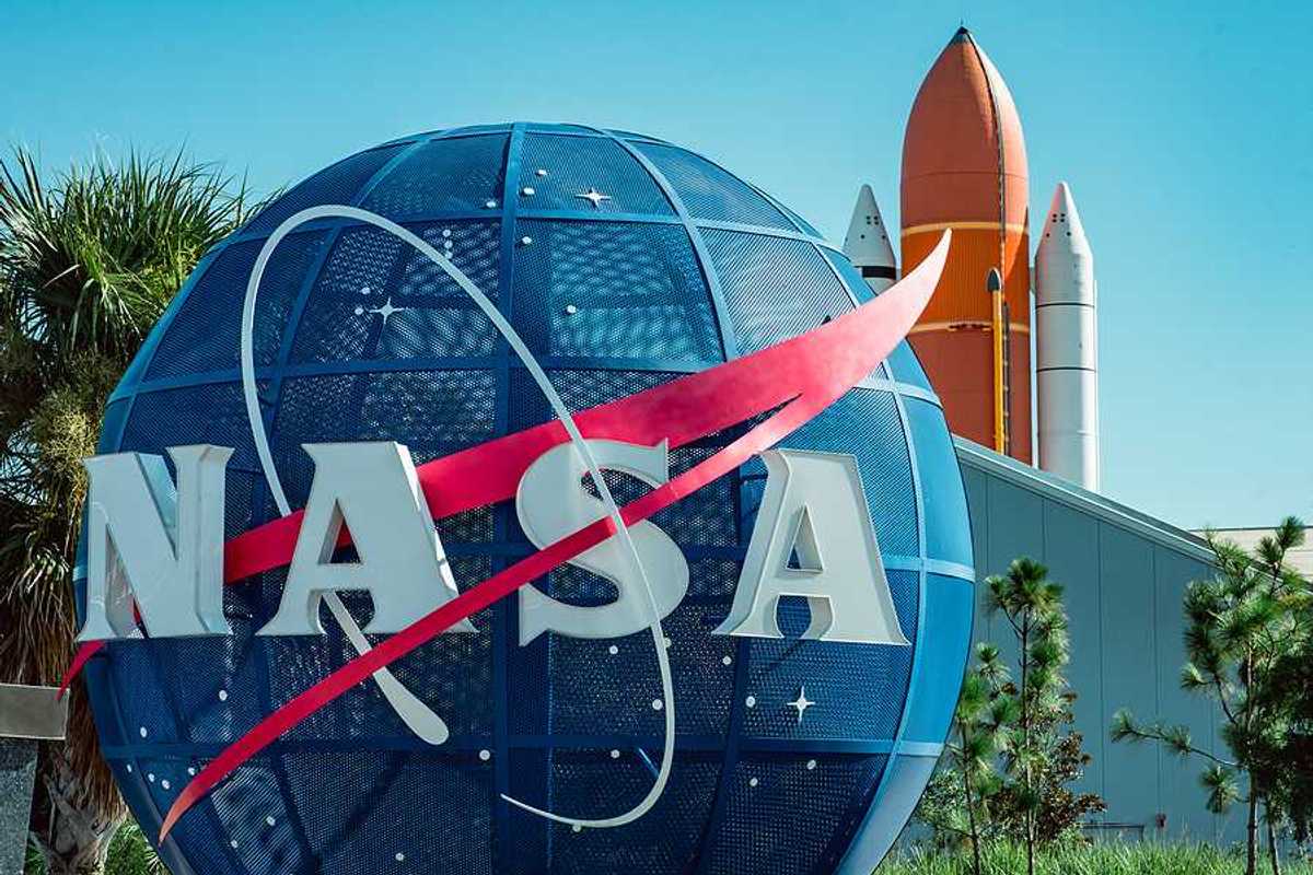 A large blue globe with the letters NASA on it