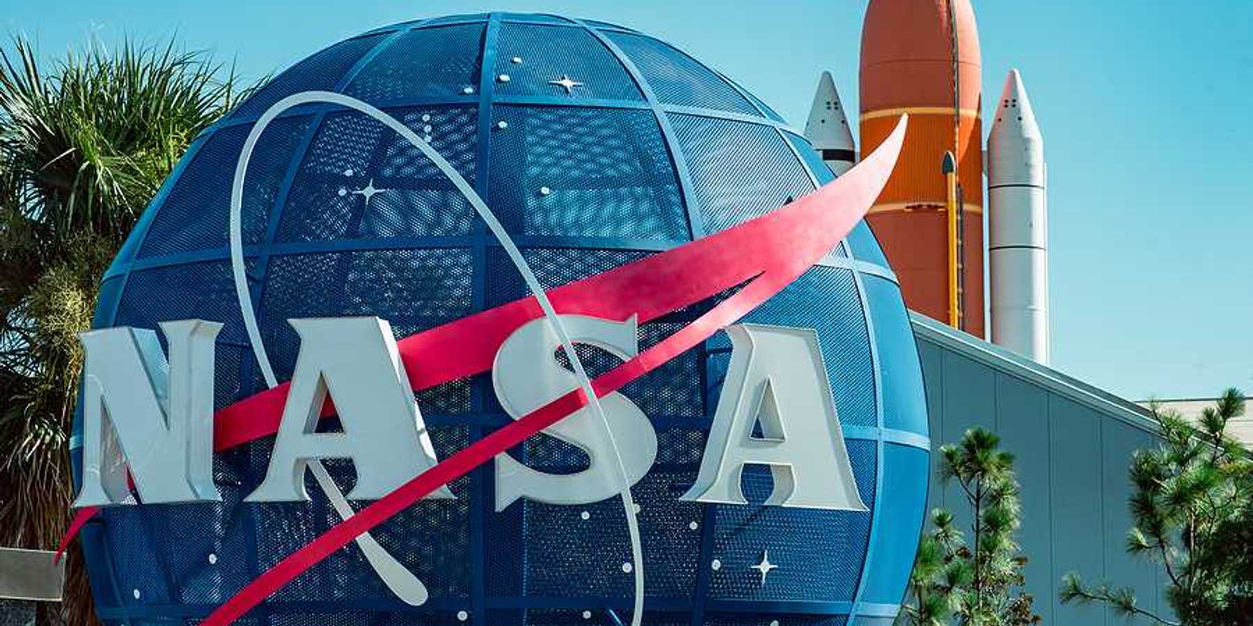 A large blue globe with the letters NASA on it