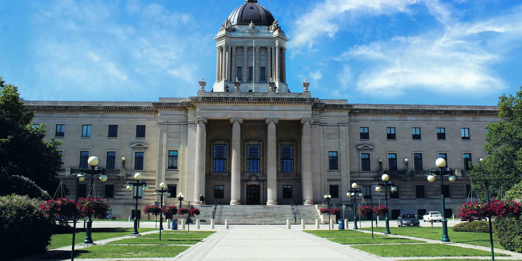a large government building with a clock tower on top of it