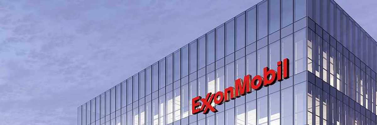 A large office building with the words ExxonMobil on the side