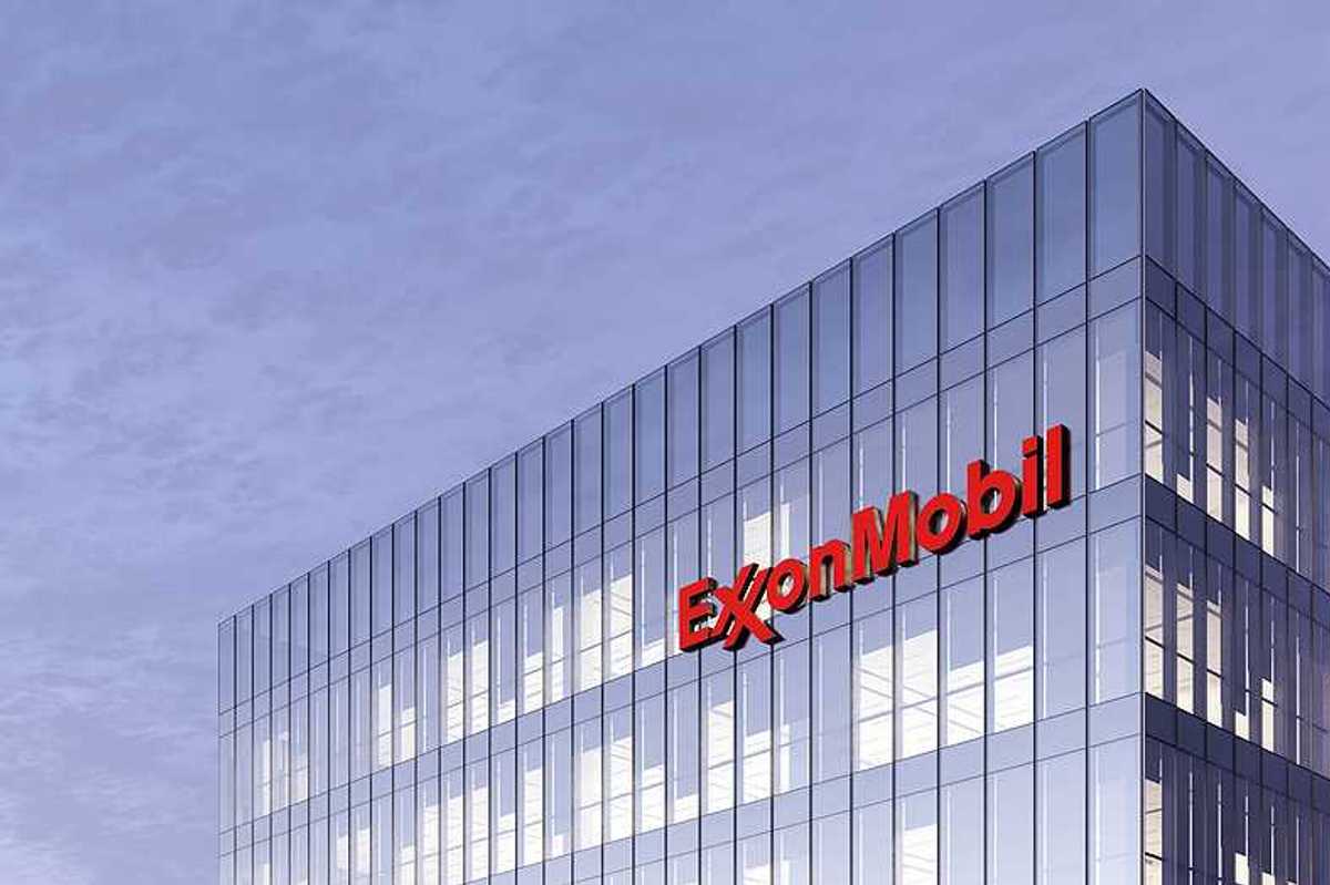 A large office building with the words ExxonMobil on the side