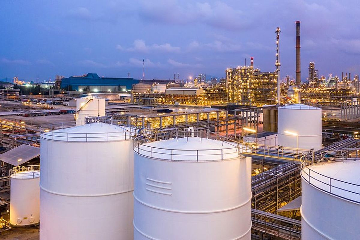 A liquid natural gas facility with storage silos.