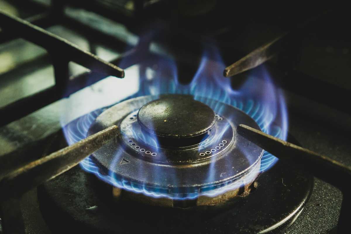 A lit gas stove burner.