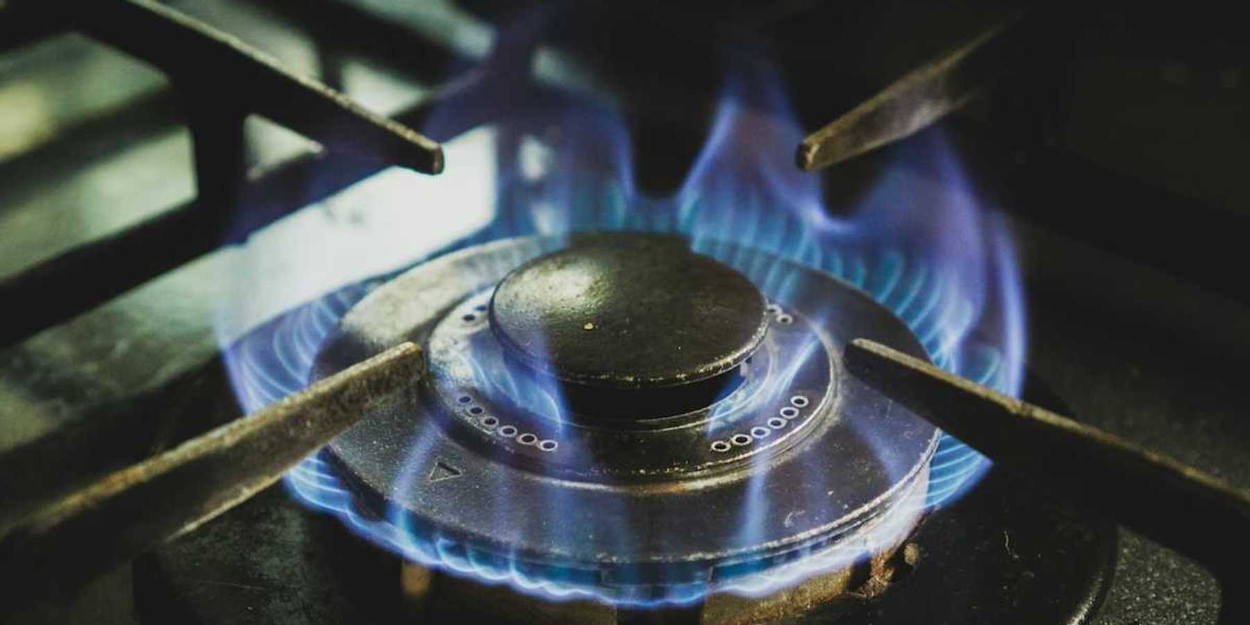 A lit gas stove burner.