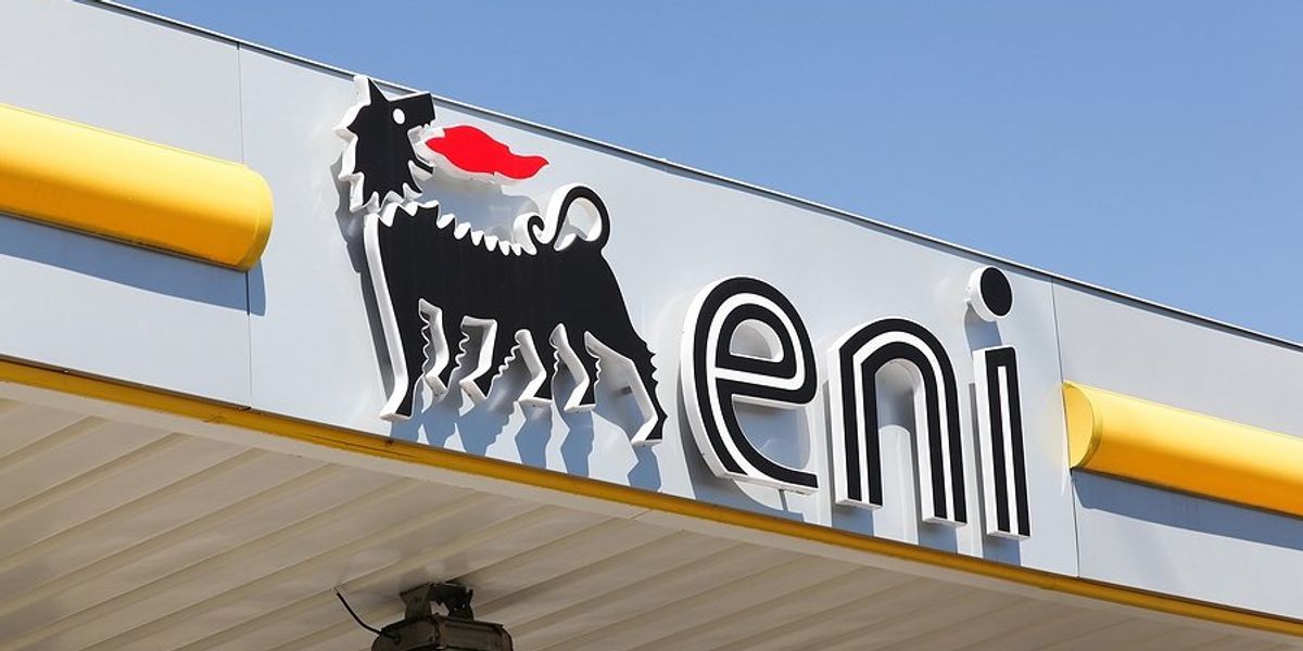 A logo for the oil company eni on the roof of a gas station.
