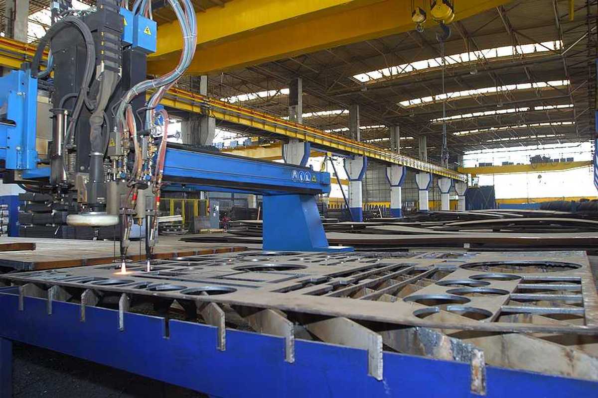 A machine for cutting steel sheets in the interior of a factory