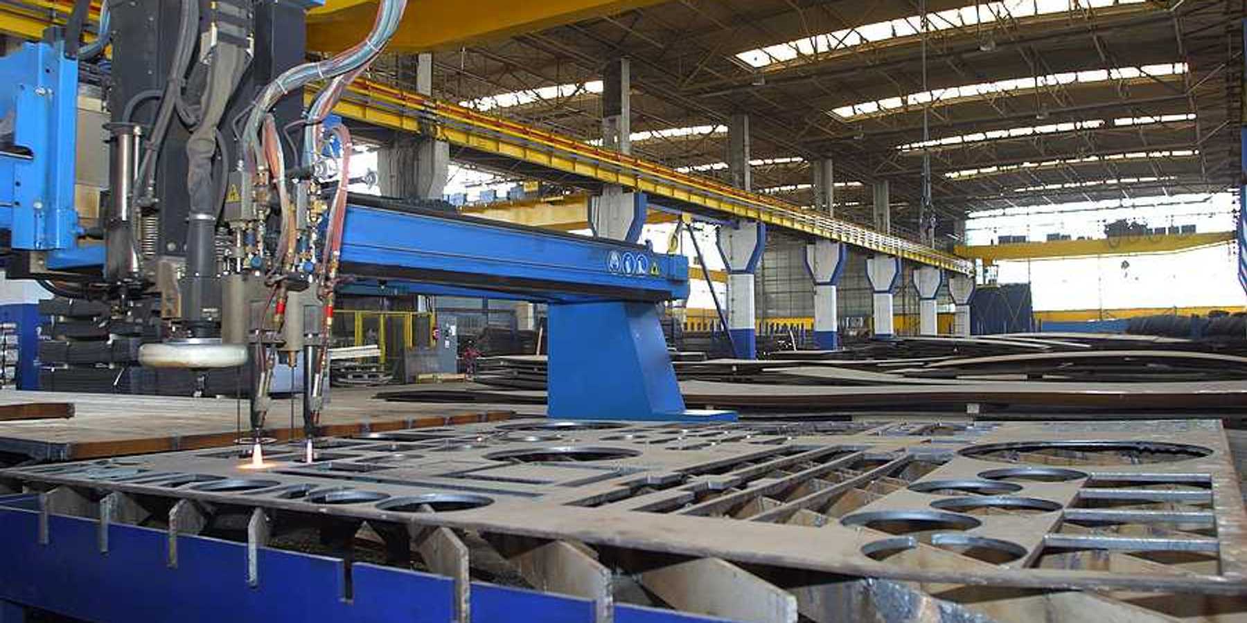 A machine for cutting steel sheets in the interior of a factory