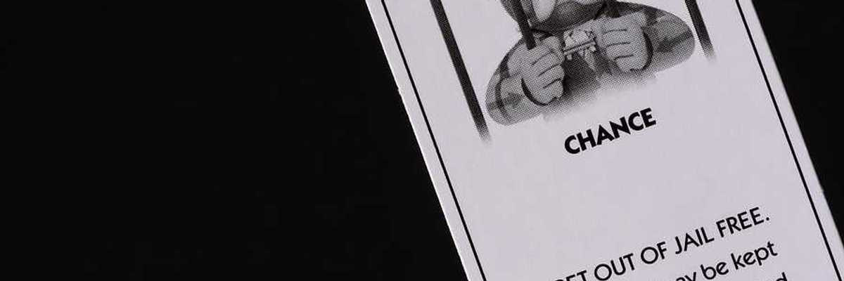 A Monopoly card that says CHANCE and Get out of jail free