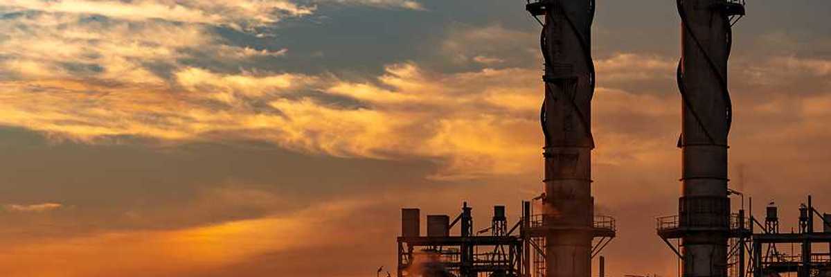 A natural gas power plant at sunset