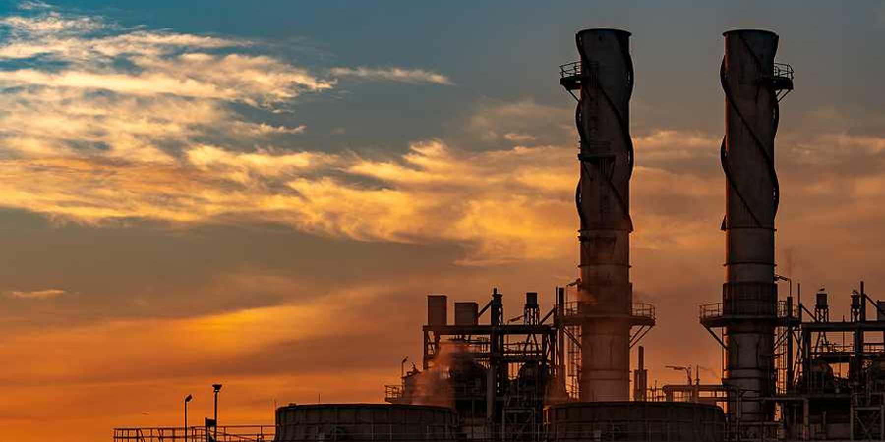 A natural gas power plant at sunset