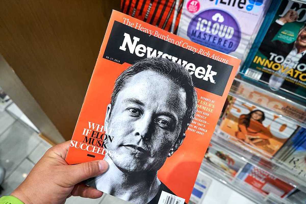 A Newsweek magazine with Elon Musk on the cover