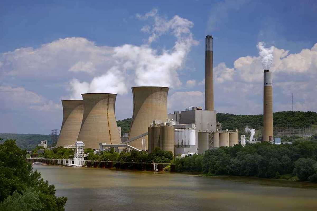 A nuclear power plant situated along a river.