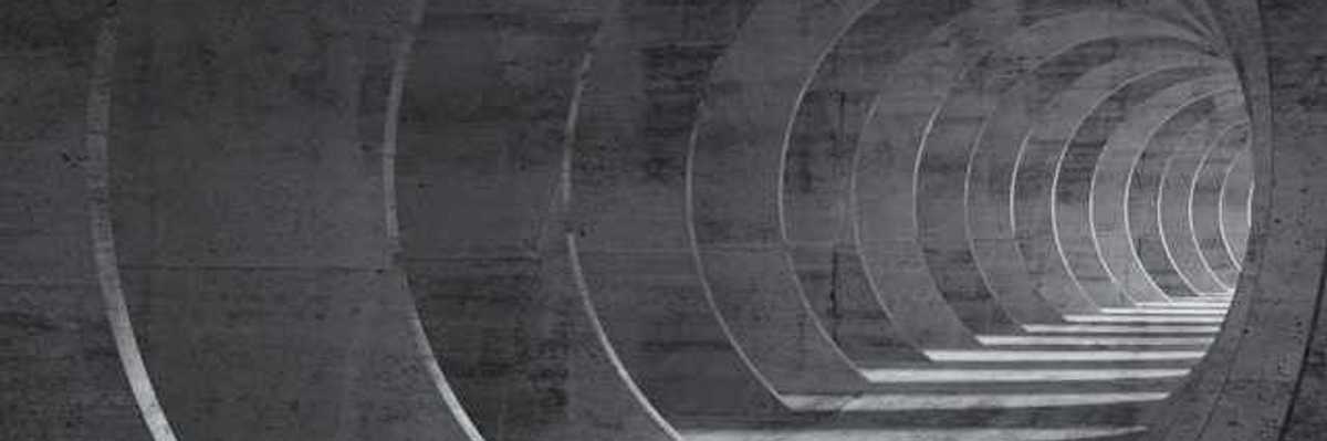 A pathway made from overlapping cement arches