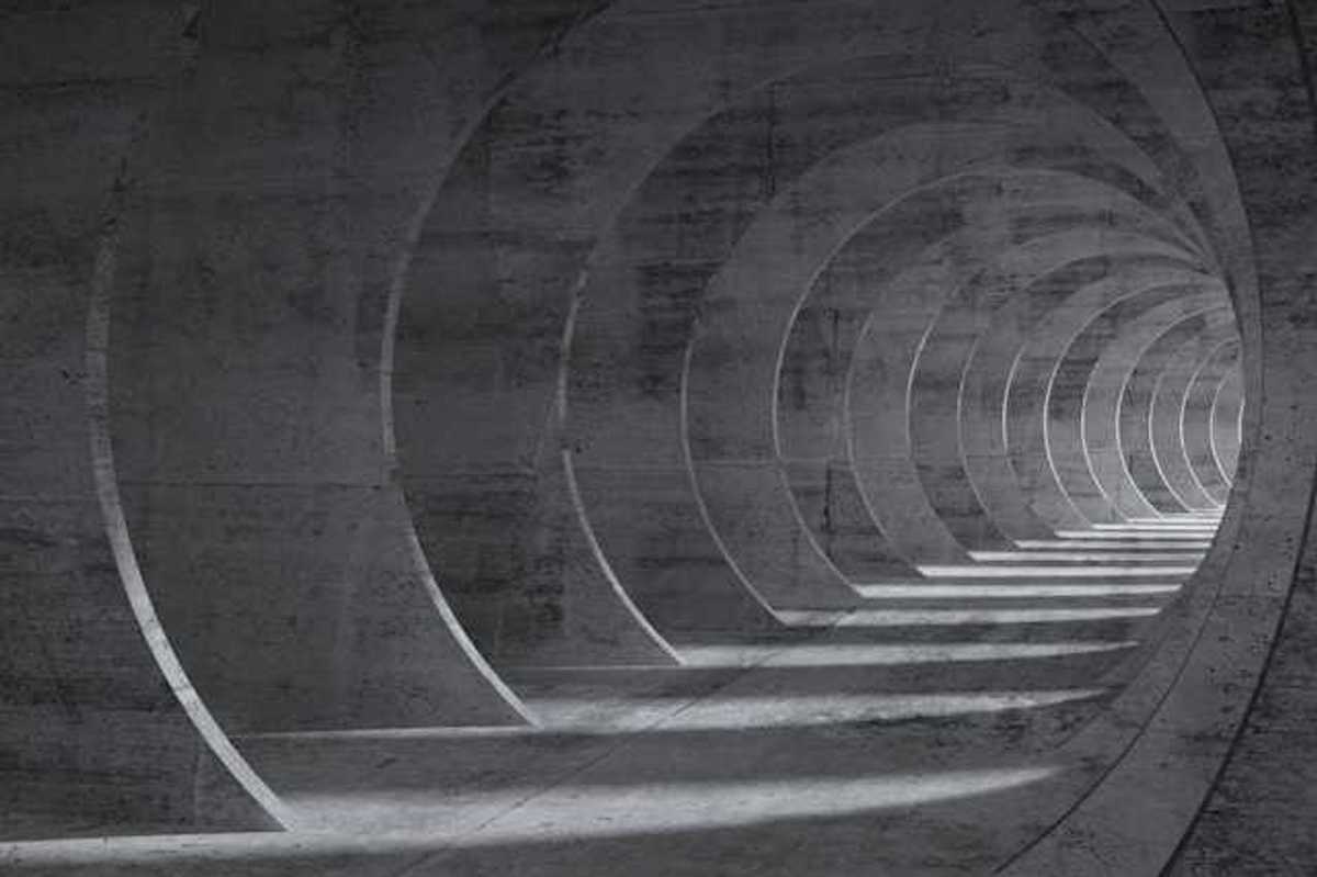 A pathway made from overlapping cement arches