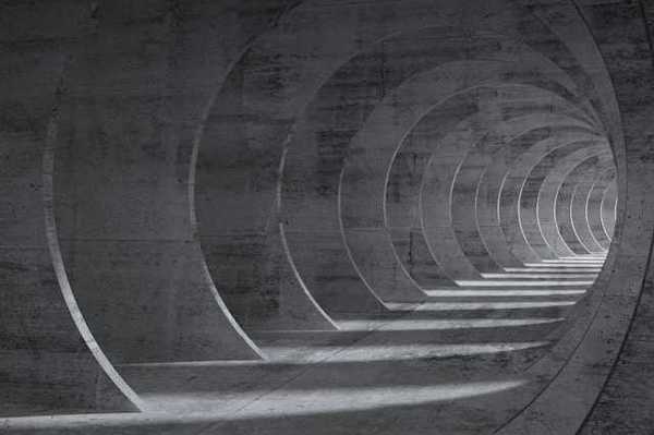A pathway made from overlapping cement arches