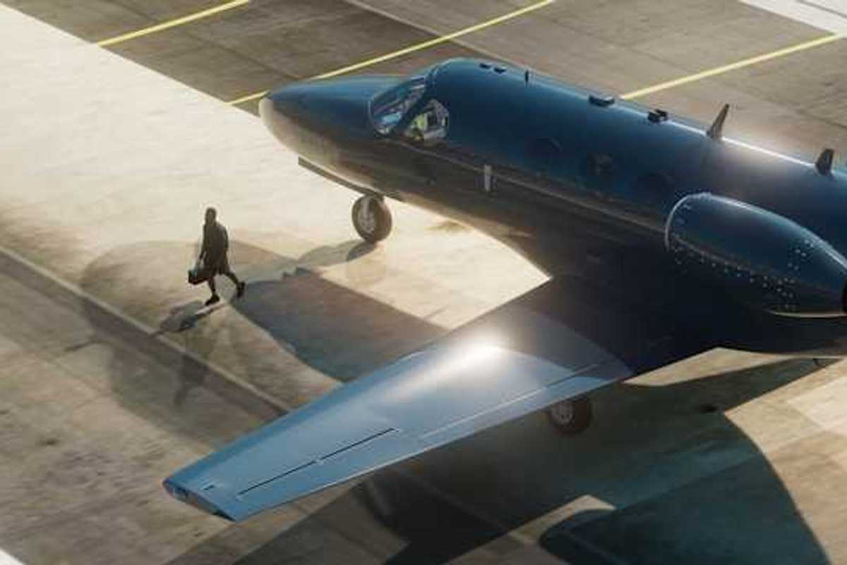 A private plane painted black sitting on the tarmac