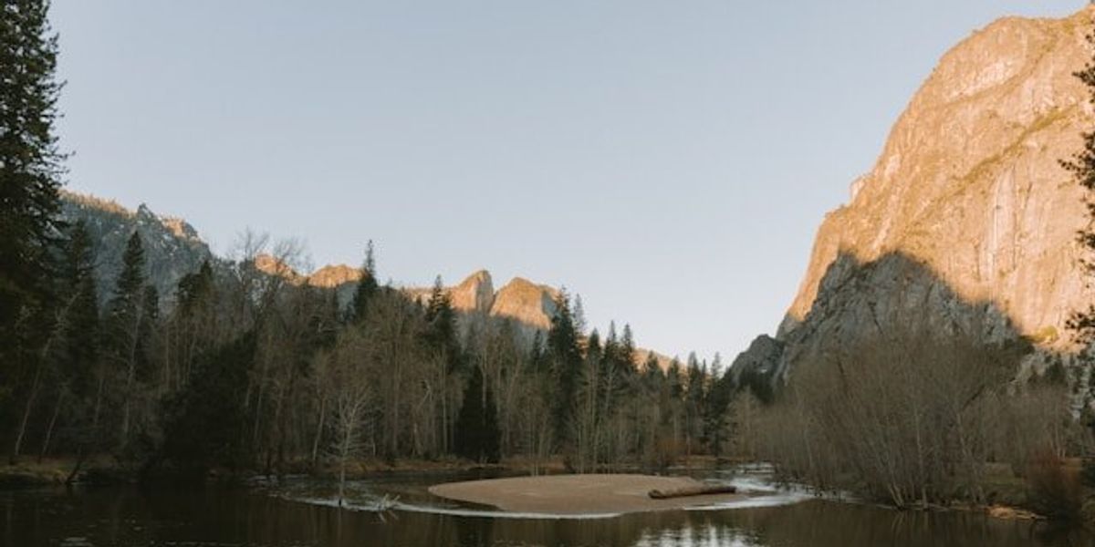 A river running between rocky hills.