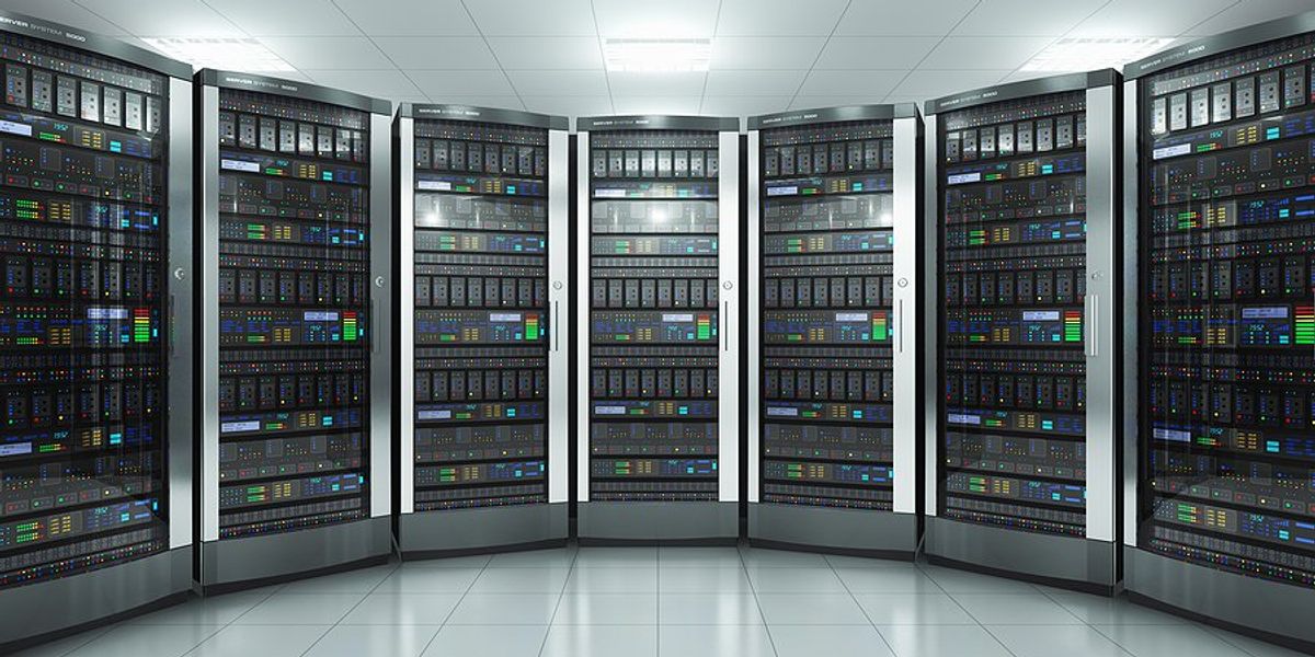 A row of data servers in a white room.