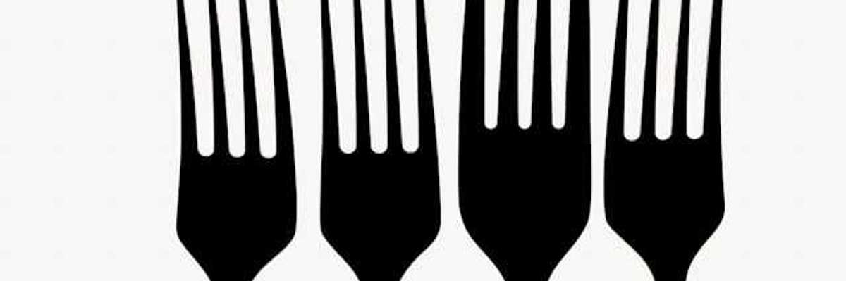 A row of forks against a white background