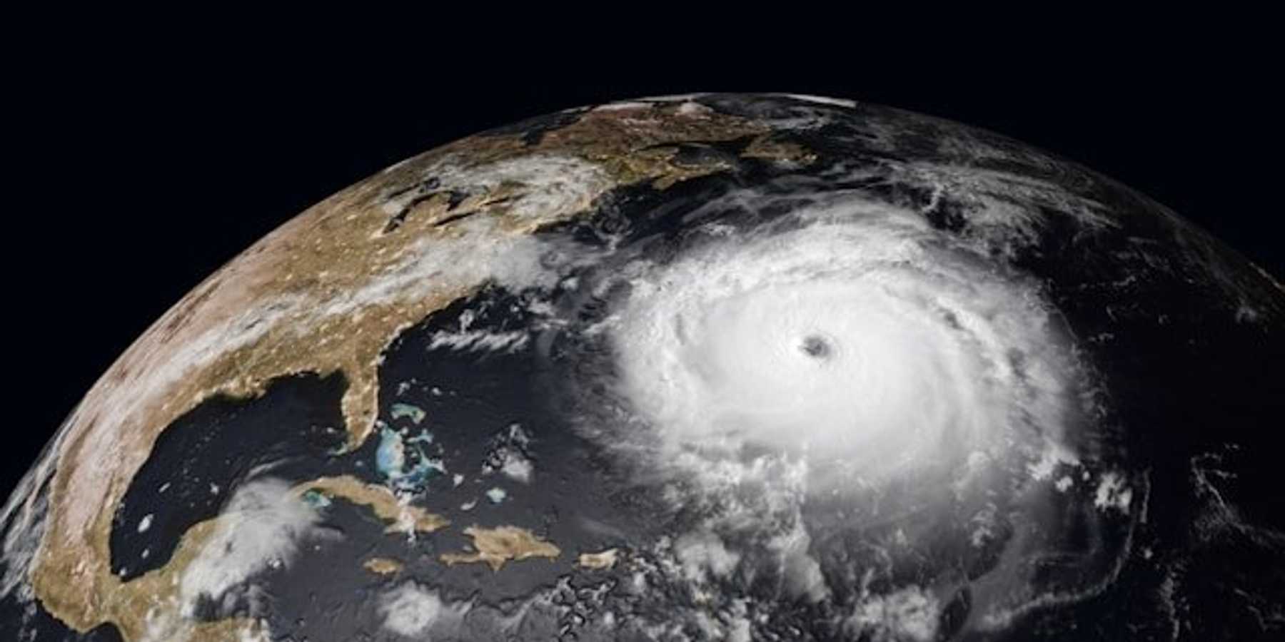 A satellite image of a hurricane approaching the east coast of the United States