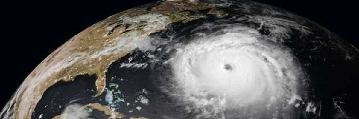 A satellite image of a hurricane approaching the east coast of the United States