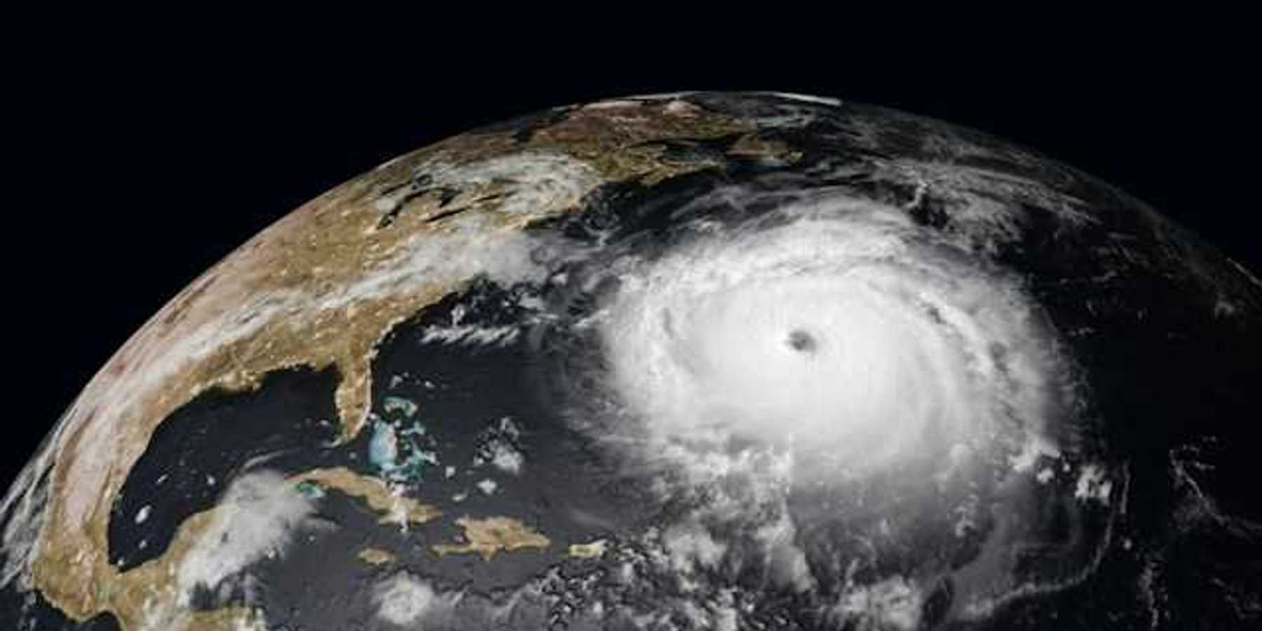 A satellite image of a hurricane approaching the east coast of the United States