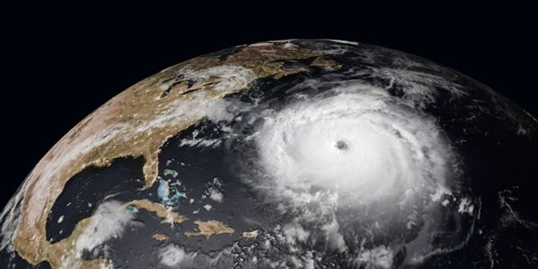 A satellite photo of a hurricane off the east coast of the United States.
