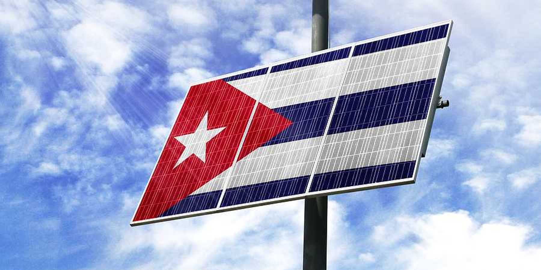 A solar panel installed on a pole imprinted with the Cuban flag