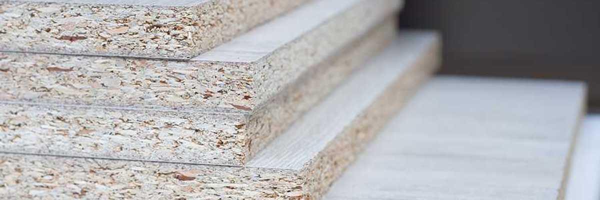 A stack of particle board viewed from the side