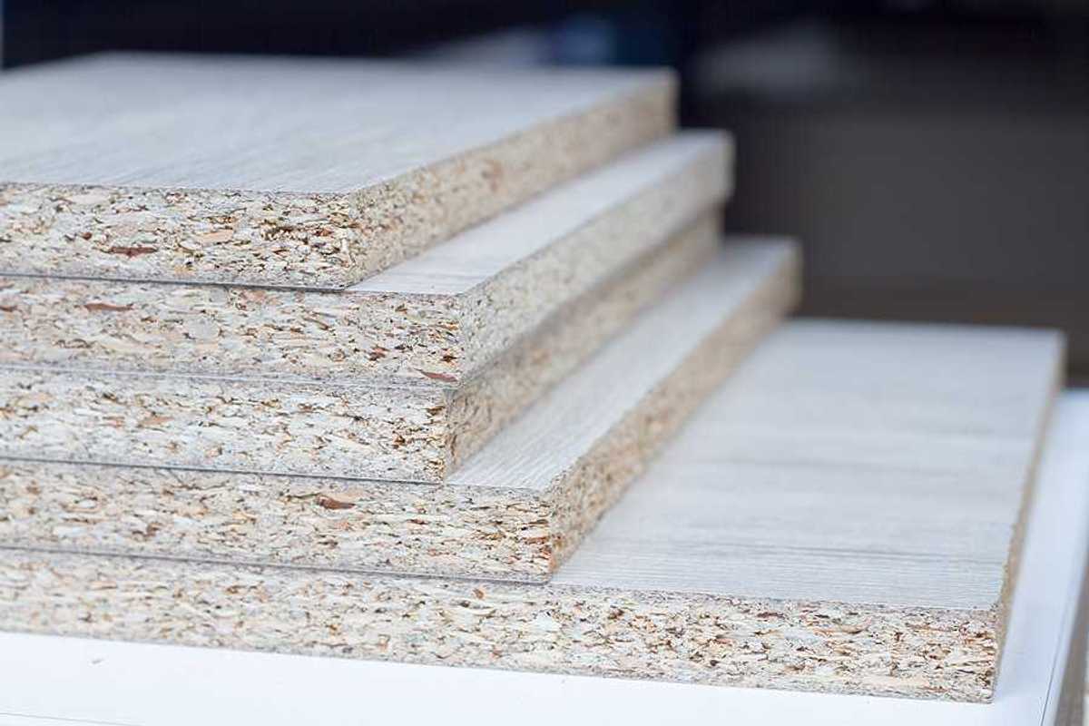 A stack of particle board viewed from the side