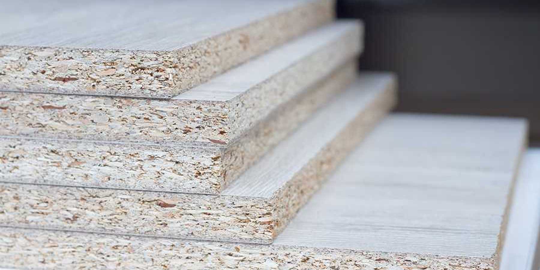 A stack of particle board viewed from the side