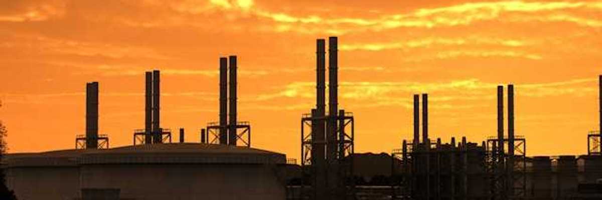 A sunset view of an industrial plant