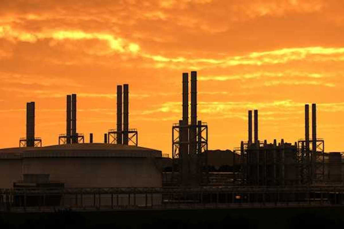 A sunset view of an industrial plant