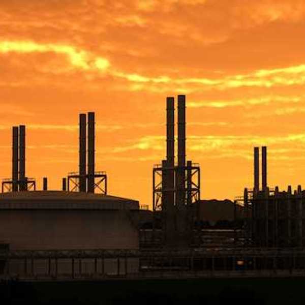 A sunset view of an industrial plant