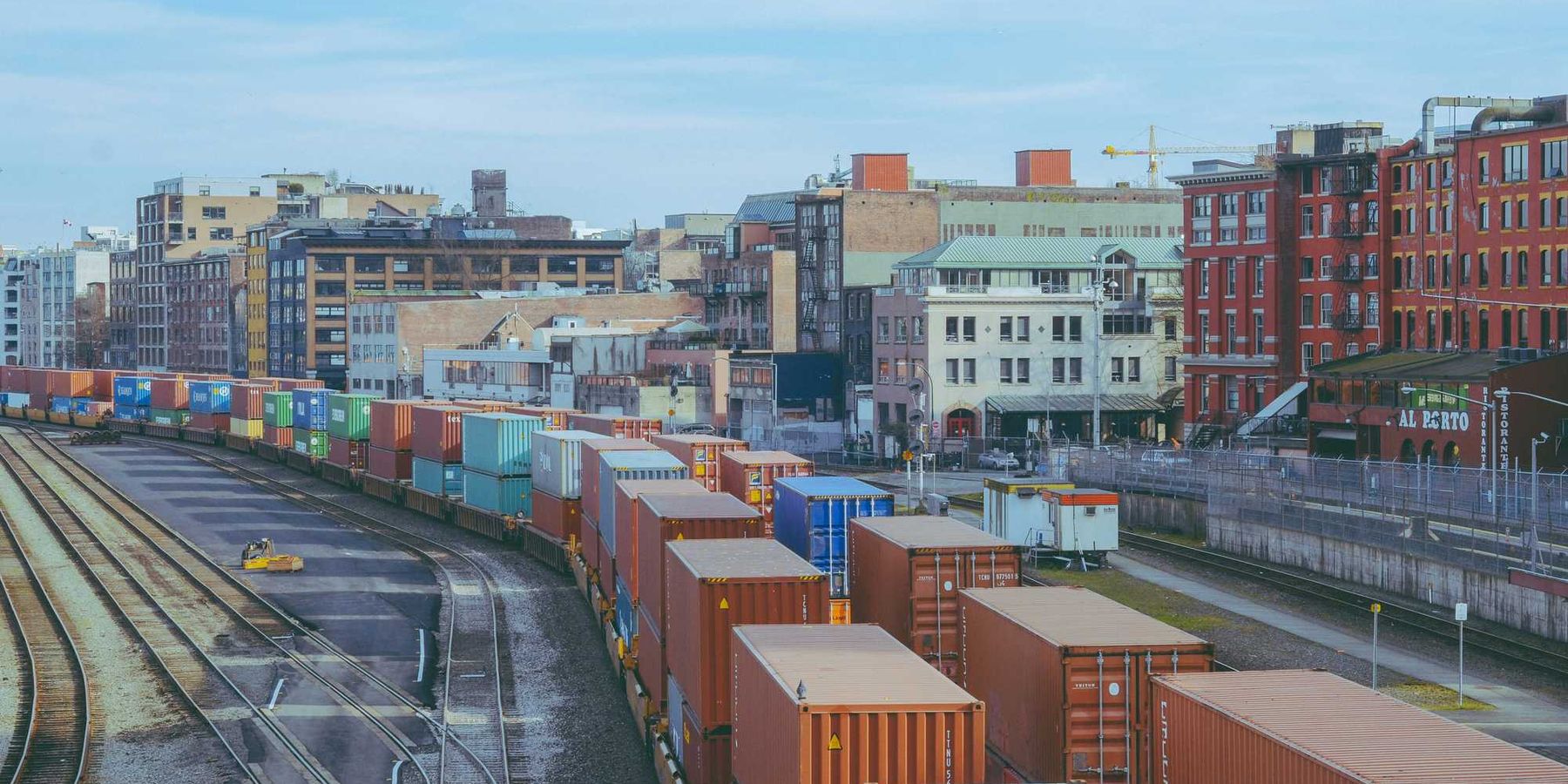 a train yard filled with lots of train cars