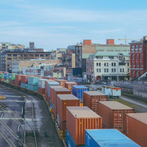 a train yard filled with lots of train cars