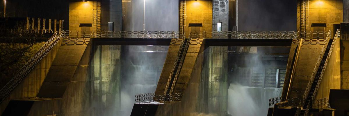 A view of a hydropower plant during a storm