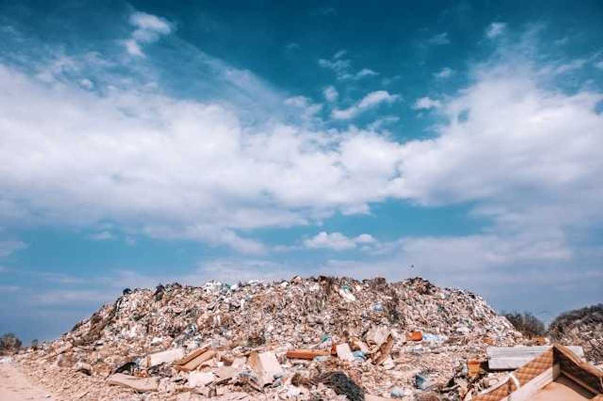 A view of a landfill against a blue sky