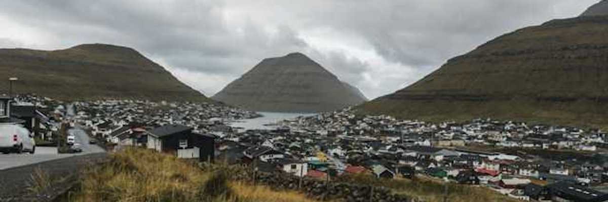 A view of a small fishing village town in the mountains